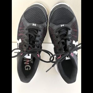 Under armor tennis shoes.